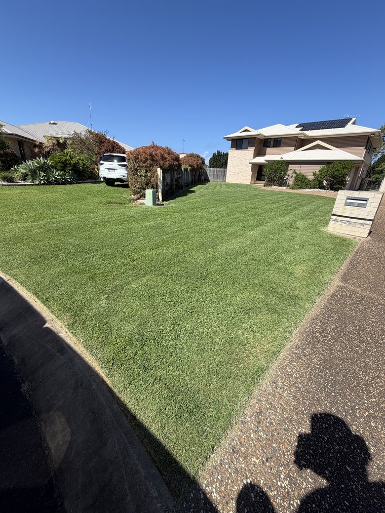 Freshly mown striped lawn with sharp edges, Bargara