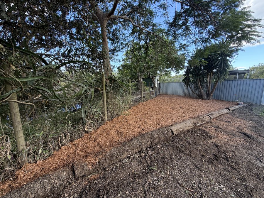 Cleared garden bed with fresh mulch after, Bundaberg