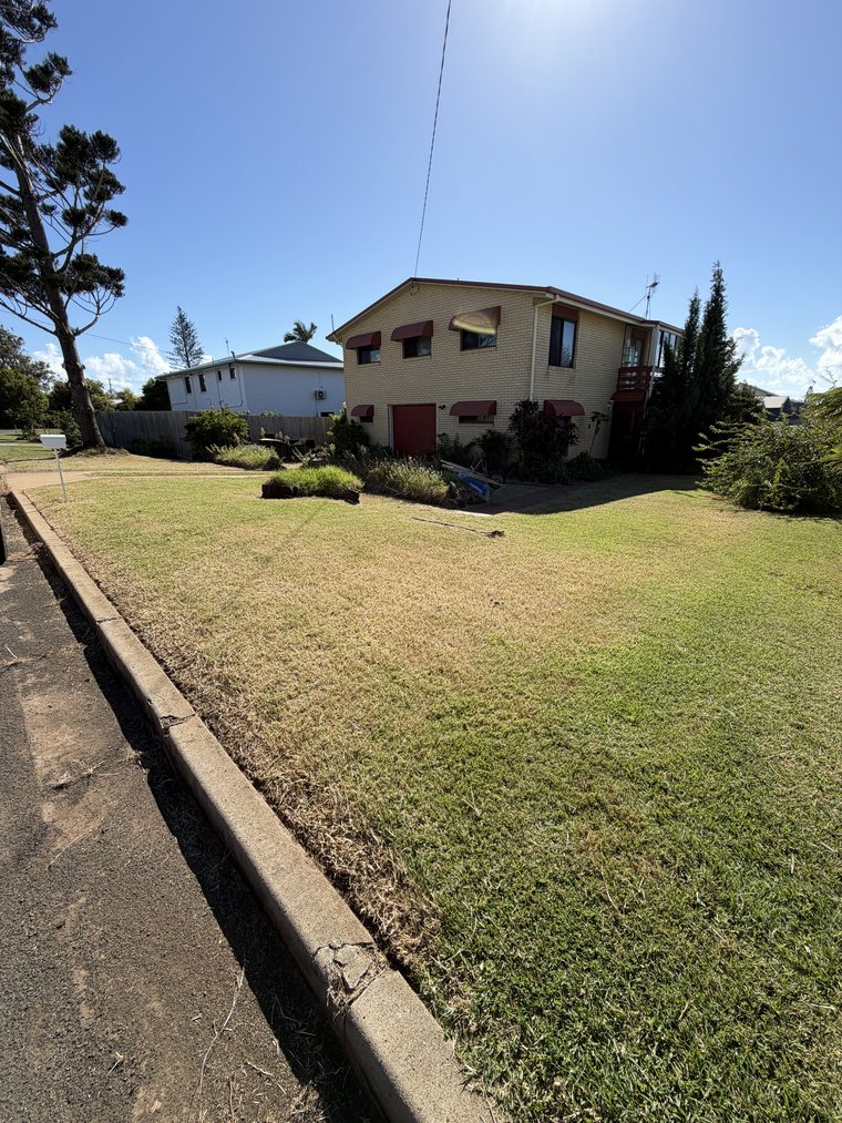Neatly mown lawn after, Elliott Heads